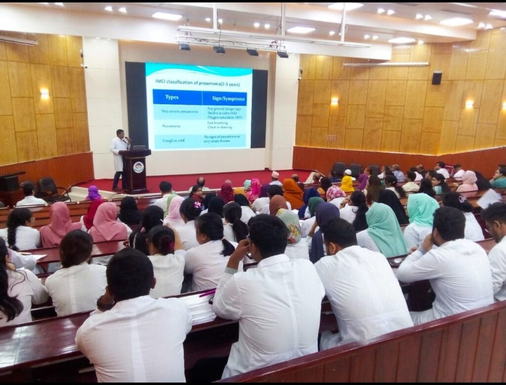 lecture gallery with the ongoing lecture on IMCI classification of Pneumonia at Rangpur Community Medical College.